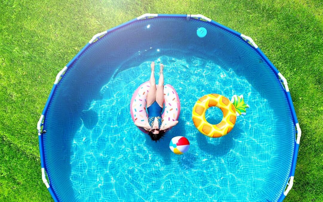 Girl resting in a metal frame pool